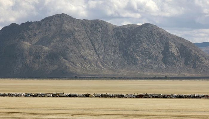 Vehicles are seen departing the Burning Man festival in Black Rock City, Nevada, September 4.—Reuters