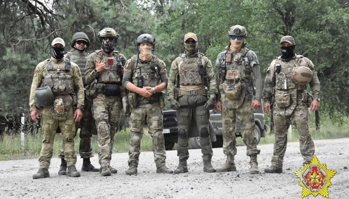 This handout picture posted on July 20, 2023, on the Belarusian Defence Ministrys Telegram channel shows a joint training of PMC Wagner fighters with Belarusian special forces servicemen at the Brestsky military ground. — AFP/File