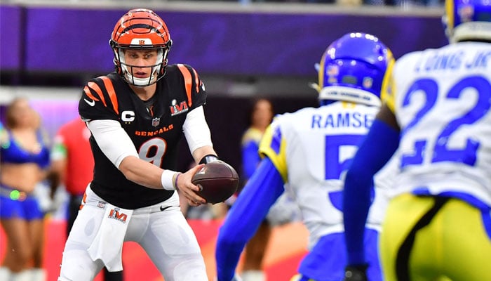 Cincinnati Bengals quarterback Joe Burrow hands off the ball to a teammate during Super Bowl LVI with the Los Angeles Rams at SoFi Stadium in Inglewood, California, on February 13, 2022. — AFP/File