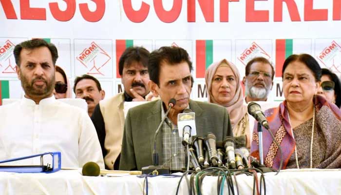 MQM-Pakistans Convener Khalid Maqbool Siddiqui (centre), flanked by party leaders Mustafa Kamal (left) and Nasreen Jalil (right), speaks during a press conference in Karachi on July 17, 2023. — Twitter/@MQMPKOfficial