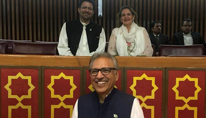 Dr Arif Alvi smiles ahead of his election as president in 2018. — Twitter/PTIofficial