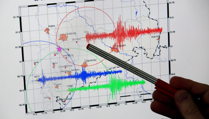 A person while pointing with a pen on a reading of an earthquake after measuring the jolts on the Richter Scale in this still taken from a video released on May 16, 2015. — Screengrab/YouTube/Seeker