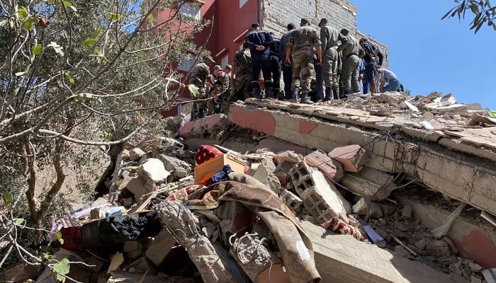 Rescuers carry a search operation following a powerful earthquake, in Amizmiz, in Morocco, September 9, 2023. —Reuters