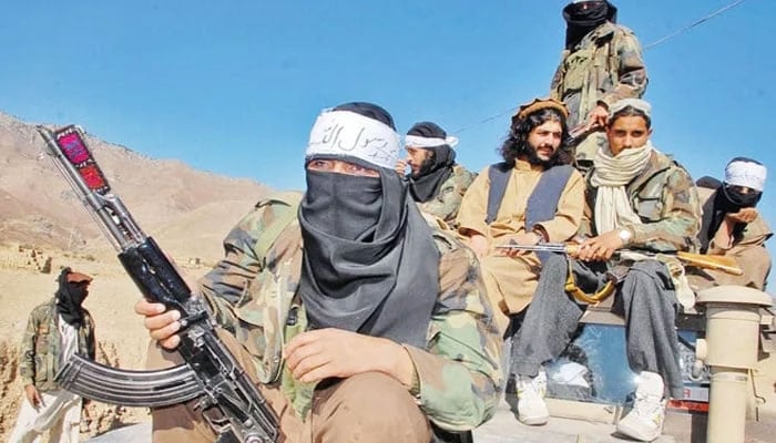 Tehreek-e-Taliban Pakistan militants travel on a pickup truck. — Reuters/File