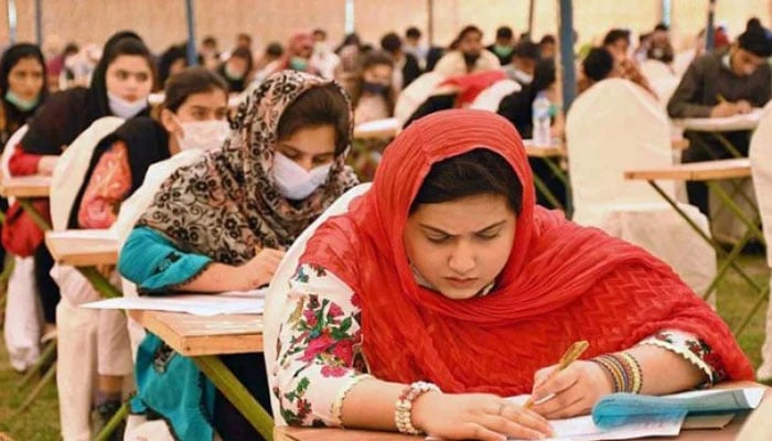 Students take an entrance exam at the Liaquat University of Medical & Health Sciences (LUMHS) in Jamshoro. — APP/File