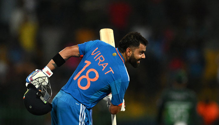 Virat Kohli celebrates after scoring a century during the Asia Cup 2023 super four ODI match between India and Pakistan at the R Premadasa Stadium in Colombo on September 11, 2023. — AFP