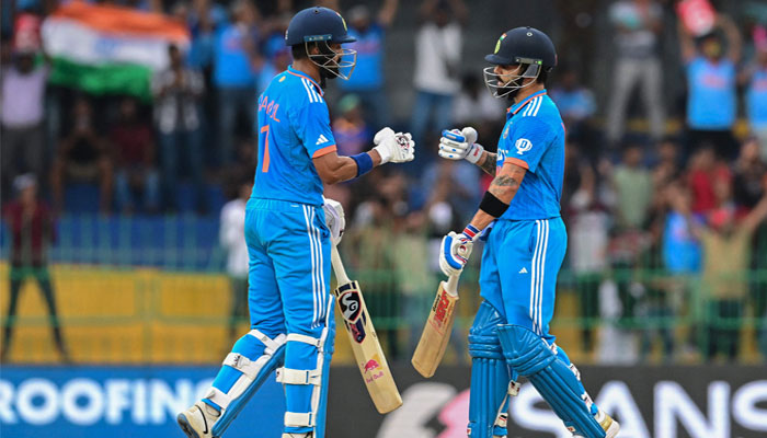 India´s Virat Kohli (right) and KL Rahul bump their fists during the Asia Cup 2023 super four ODI cricket match between India and Pakistan at the R. Premadasa Stadium in Colombo on September 11, 2023. — AFP