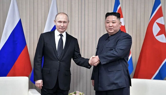 North Korean leader Kim Jong-un (R) with Russian President Vladimir Putin in Vladivostok, Russia, in April 2019. — AFP