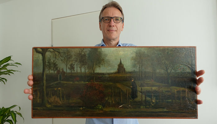 Dutch art detective Arthur Brand poses with the painting titled Parsonage Garden at Nuenen in Spring, painted by Vincent van Gogh in 1884, at his home in Amsterdam, Netherlands on September 11, 2023. — X/@brand_arthur