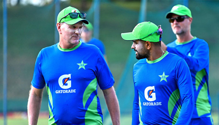 Pakistan´s captain Babar Azam (right) talks with his team coach Grant Bradburn during a practice session at the Mahinda Rajapaksa International Cricket Stadium in Hambantota on August 21, 2023. — AFP
