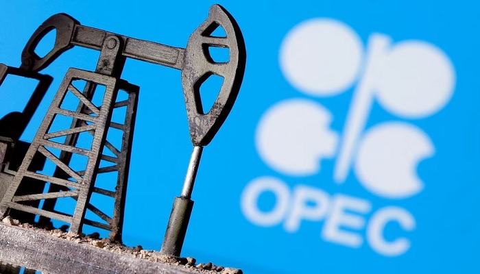 A 3D-printed oil pump jack is seen in front of displayed OPEC logo in this illustration picture, April 14, 2020. —Reuters/File
