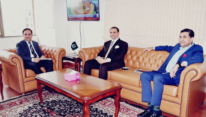 Minister for IT and Telecommunication Dr Umar Saif with PTCL Group President Hatem Bamatraf. — Ministry