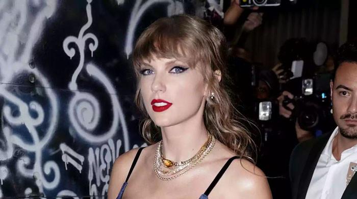 Taylor Swift rocks denim mini dress for historic VMAs afterparty