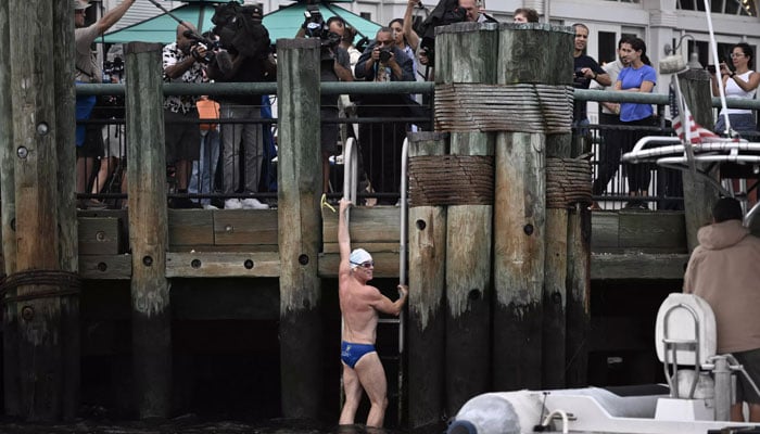 Lewis Pugh arrives at the finish of his 315-mile Hudson river swim in New York. AFP