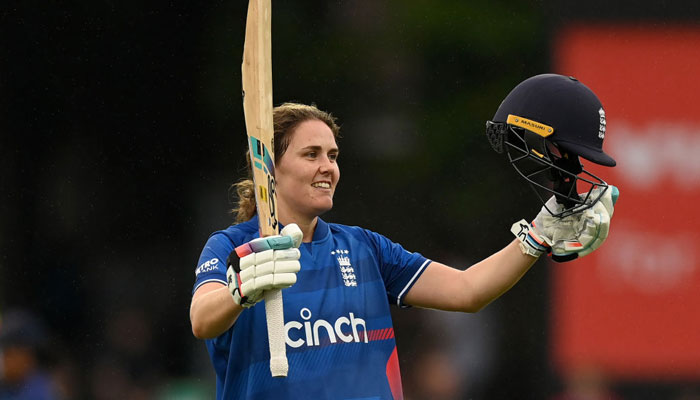 England Womens Nat Sciver-Brunt responds to the cheering crowd after making a record-breaking century on her 100th ODI during ICC Womens T20WC 2023 played against Sri Lanka on September 14, 2023, in Leicester, UK. — X/@cricbuzz