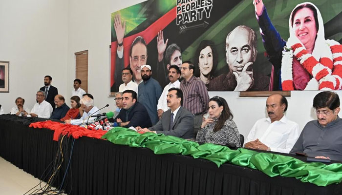 Pakistan Peoples Party Chairman Bilawal Bhutto Zardari, flanked by other senior leaders of his party, talking to the media after the CEC meeting. — PPP