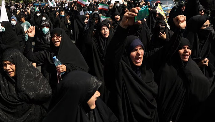 Pro-government people rally against the recent protest gatherings in Iran, after the Friday prayer ceremony in Tehran, Iran September 23, 2022.—Reuters