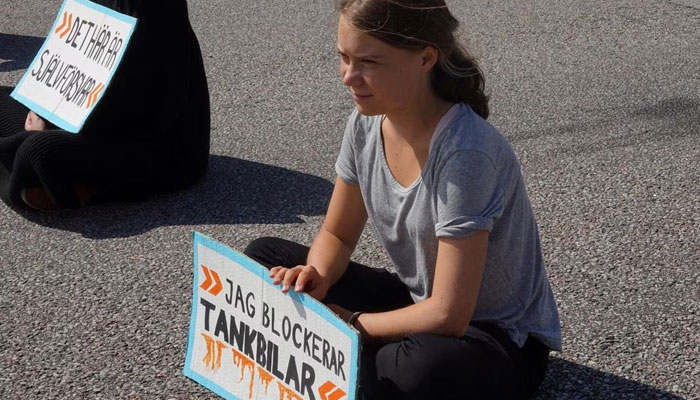 Climate activist Greta Thunberg and other activists block the entrance to the Oljehamnen, in Malmo, Sweden, July 24, 2023.—Reuters