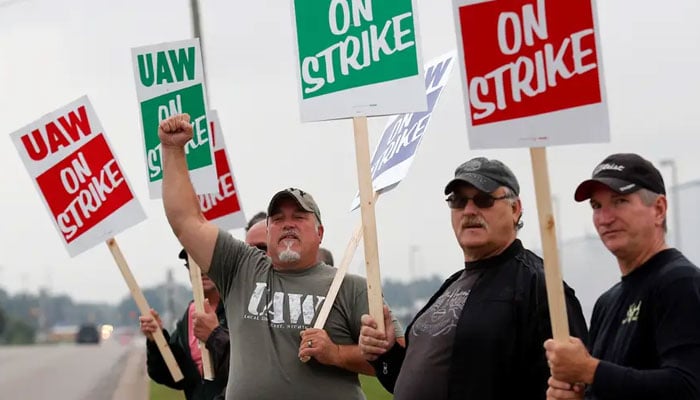 General Motors assembly workers outside the GM Powertrain Flint Engine plant during the United Auto Workers national strike in Michigan. Reuters