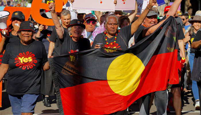 People take part in a Walk for Yes rally in Sydney on September 17, 2023.—AFP