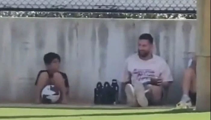 Lionel Messi at the Inter Miami Academy waiting for his son Thiago to start training. — Screengrab