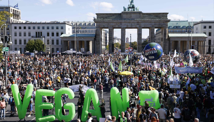 The Fridays for Future movement and other activists protest at the Brandenburg Gate in Berlin on September 15, 2023.—AFP