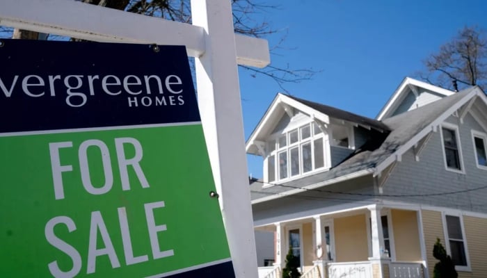 An image of a For Sale sign displayed in Falls Church, VA. — AFP/Files
