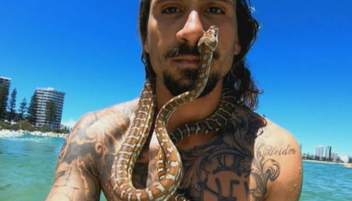 An image of Higor Fiuza and his python, Shiva — Instagram/Files