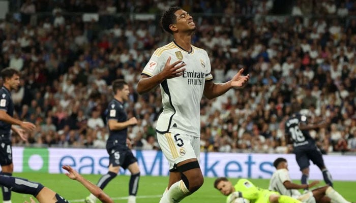 Real Madrids English midfielder #5 Jude Bellingham reacts during the Spanish Liga football match betweem Real Madrid and Real Sociedad at at the Santiago Bernabeu stadium in Madrid on September 17, 2023.- AFP