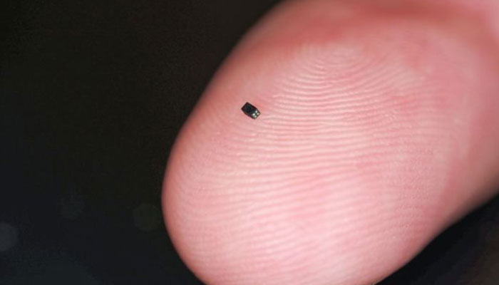 The worlds tiniest camera placed on a fingertip to highlight the size of the camera. — X/@gamepressurecom