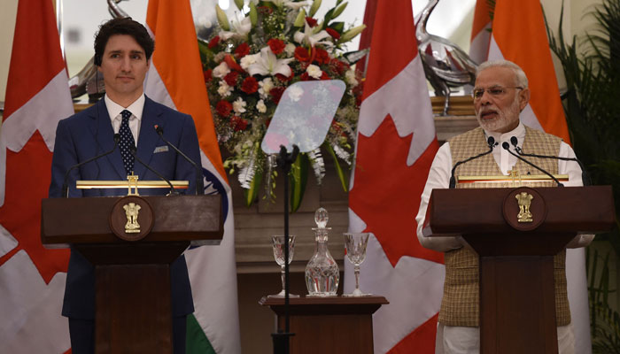 Indian Prime Minister Narendra Modi (R) speaks as Canadian Prime Minister Justin Trudeau looks on at a joint press statement at Hyderabad House in New Delhi on February 23, 2018. — AFP/File