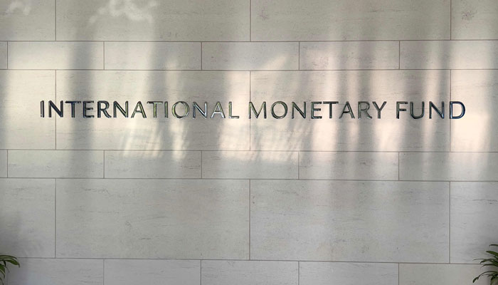 A logo is seen outside the headquarters of the International Monetary Fund (IMF) on June 30, 2015, in Washington, DC. — AFP