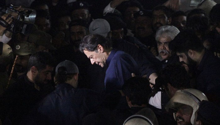 PTI Chairman Imran Khan seen during a visit to a court in this undated picture. — Reuters/File