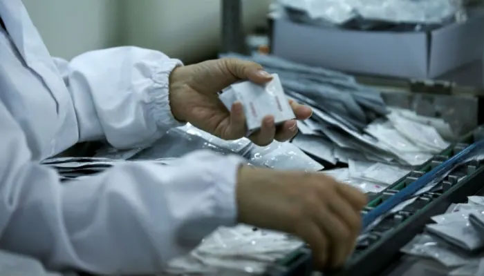 A production line at a condom factory. -Reuters/file