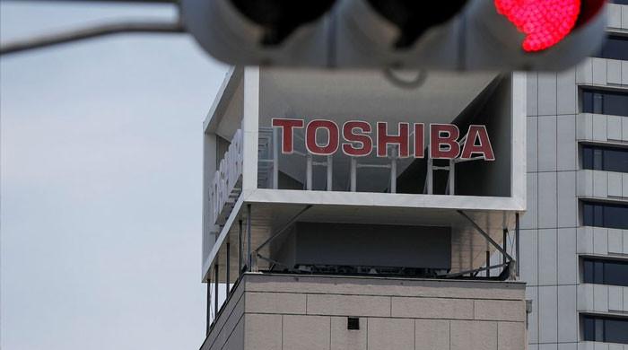 Toshiba ends 70-year inventory market stint as personal consortium completes $13.5 billion buyout