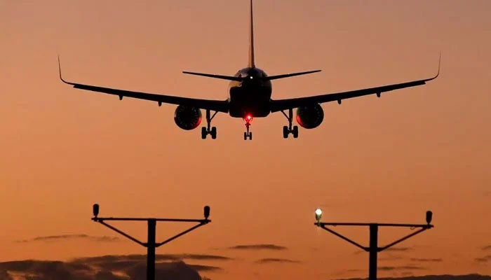 A passenger aircraft descends to land at Heathrow Airport in London, Britain, January 5, 2022. — Reuters