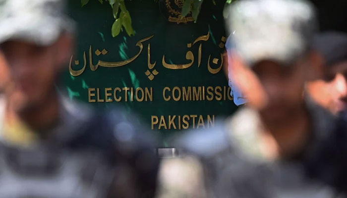 Paramilitary soldiers stand guard outside the Pakistans election commission building in Islamabad on August 2, 2022. — AFP