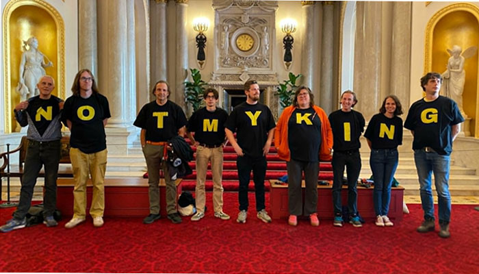 Anti-monarchy group activists protest inside Buckingham Palace