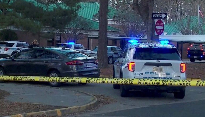 Police vehicles are seen parked outside a school, where a shooting took place in Virginia, US, January 6, 2023. — Reuters