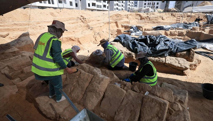 A team of archaeologists work on September 23, 2023, at the site of a cemetery dating from the Roman era, discovered in 2022 in Beit Lahia in the northern Gaza Strip. — AFP/File