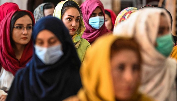 Afghan women take part in a gathering in Kabul to speak out against human rights violations by the Taliban regime — AFP/File