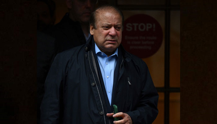 Former Prime Minister Nawaz Sharif, brother of Pakistan´s current Prime Minister Shehbaz Sharif, leaves from a property in west London on May 11, 2022. — AFP