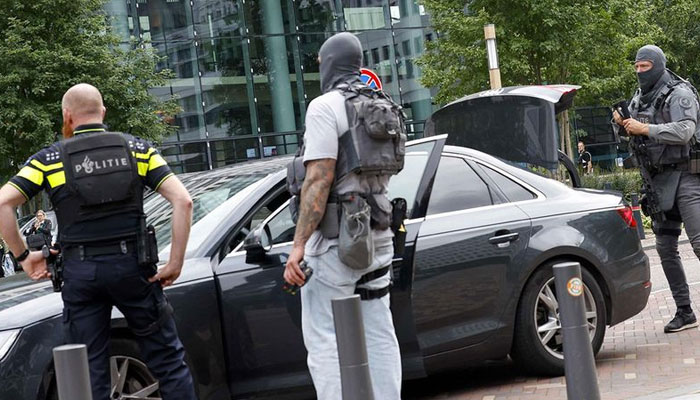 Police officers from the special intervention service take part in an operation at the Erasmus MC hospital that has been cordoned off following reports of a shooting, in Rotterdam, on September 28, 2023. — AFP