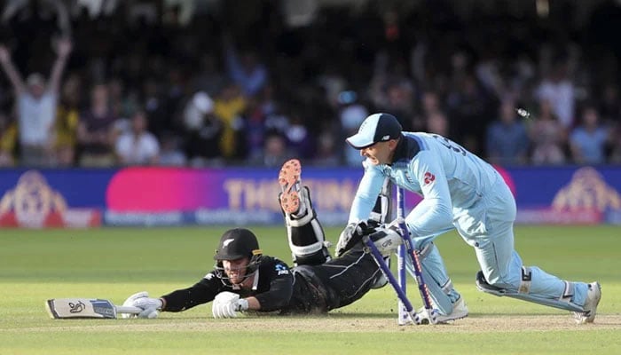 Jos Buttler removes the stumps as England are confirmed as the World Champions for the first time in history. — AFP