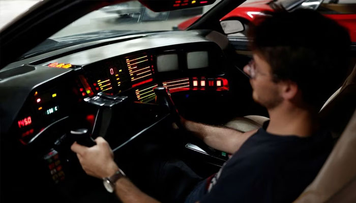 An employee sits inside KITT, a replica car of TV series Knight Rider, at the Pop Central museum dedicated to legendary vehicles and car replicas from the world of cinema and television in Etrechy, near Paris, France, September 17, 2023.—Reuters