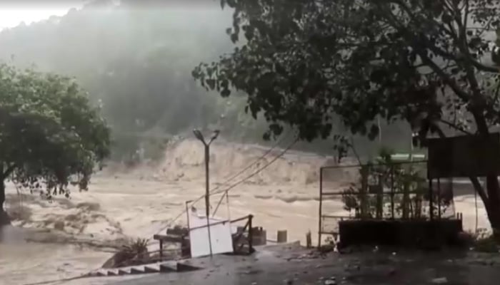 Overflowing Teesta River after heavy rain in Indias Sikkim seen in this still from a video on October 4, 2023.. — Reuters