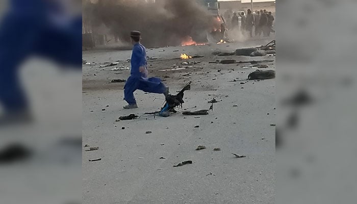 A child runs near the site of a roadside bomb blast in Chaghi bazaar on October 4, 2023. — Author