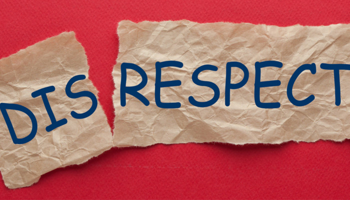 A representational image shows disrespect written on a piece of torn paper. — Unsplash
