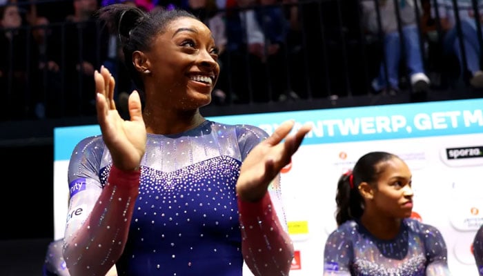 Simone Biles celebrates during the womens team final at the 2023 Artistic Gymnastics World Championships. CNN