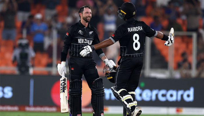 New Zealands Devon Conway and Rachin Ravindra celebrate victory in first World Cup 2023 match on October 5, 2023. — X/@BLACKCAPS